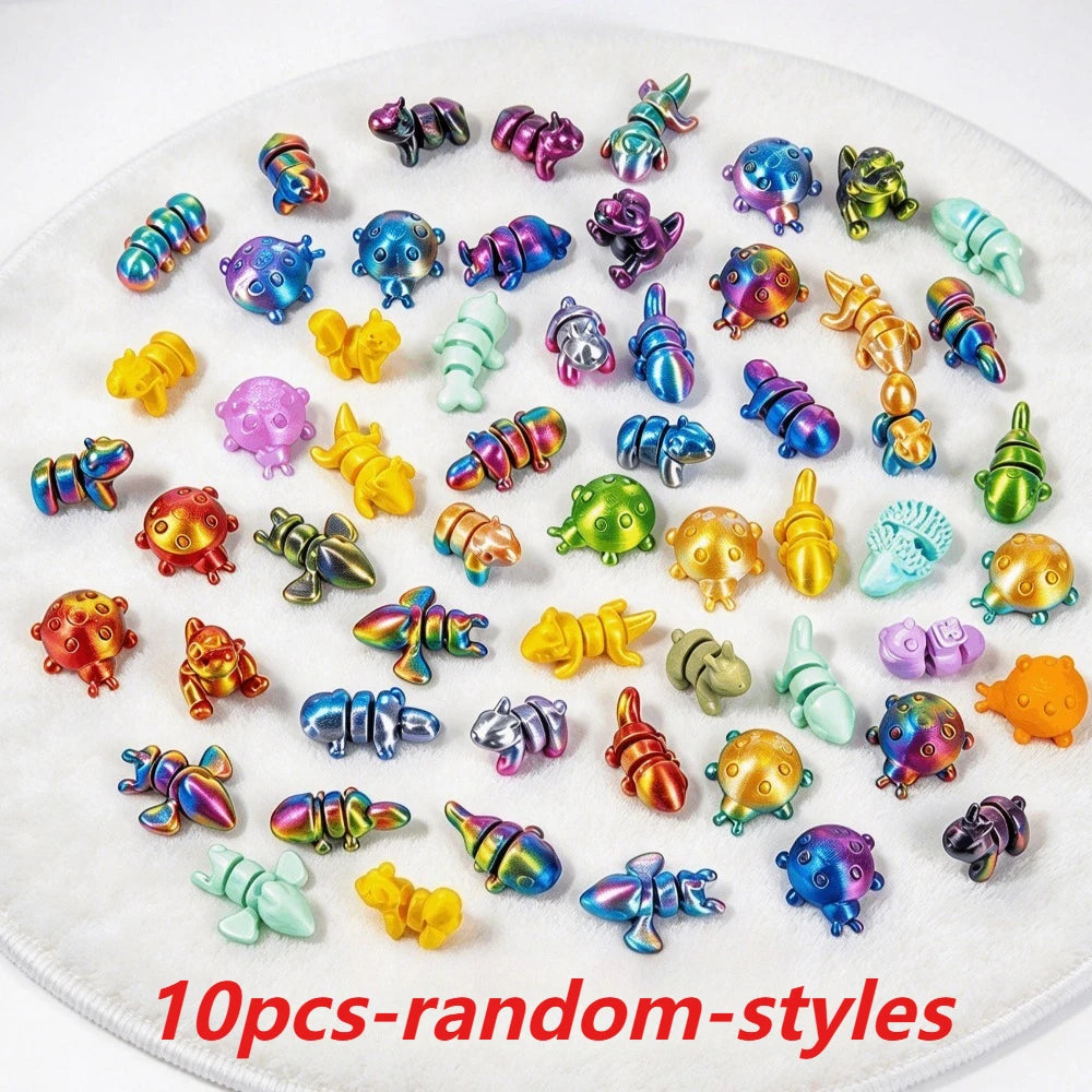 A collection of 10 random-style 3D printed articulated animal figurines in various colors and textures.