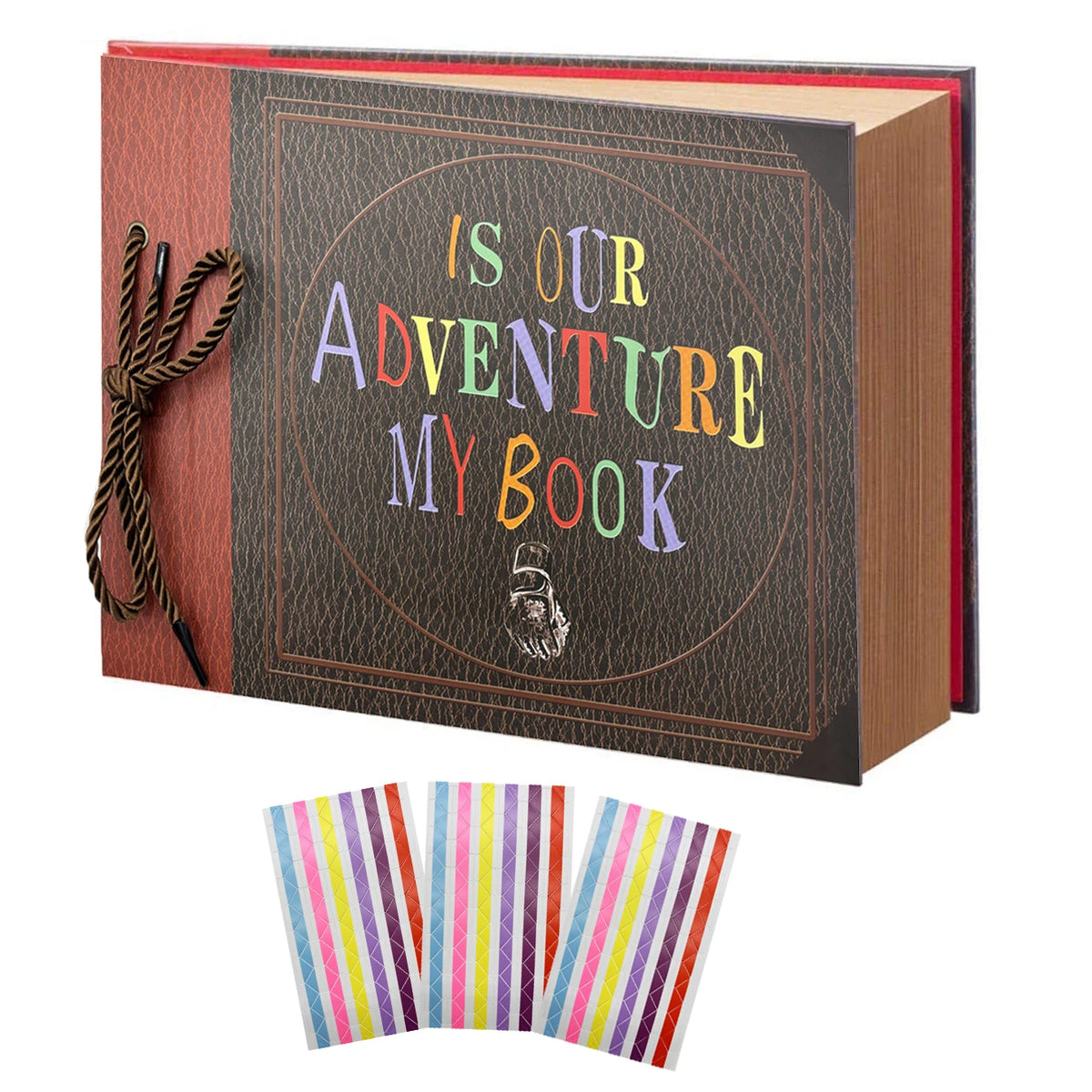 A handmade scrapbook album with a dark cover featuring the text Is Our Adventure My Book and a gold rope detail.