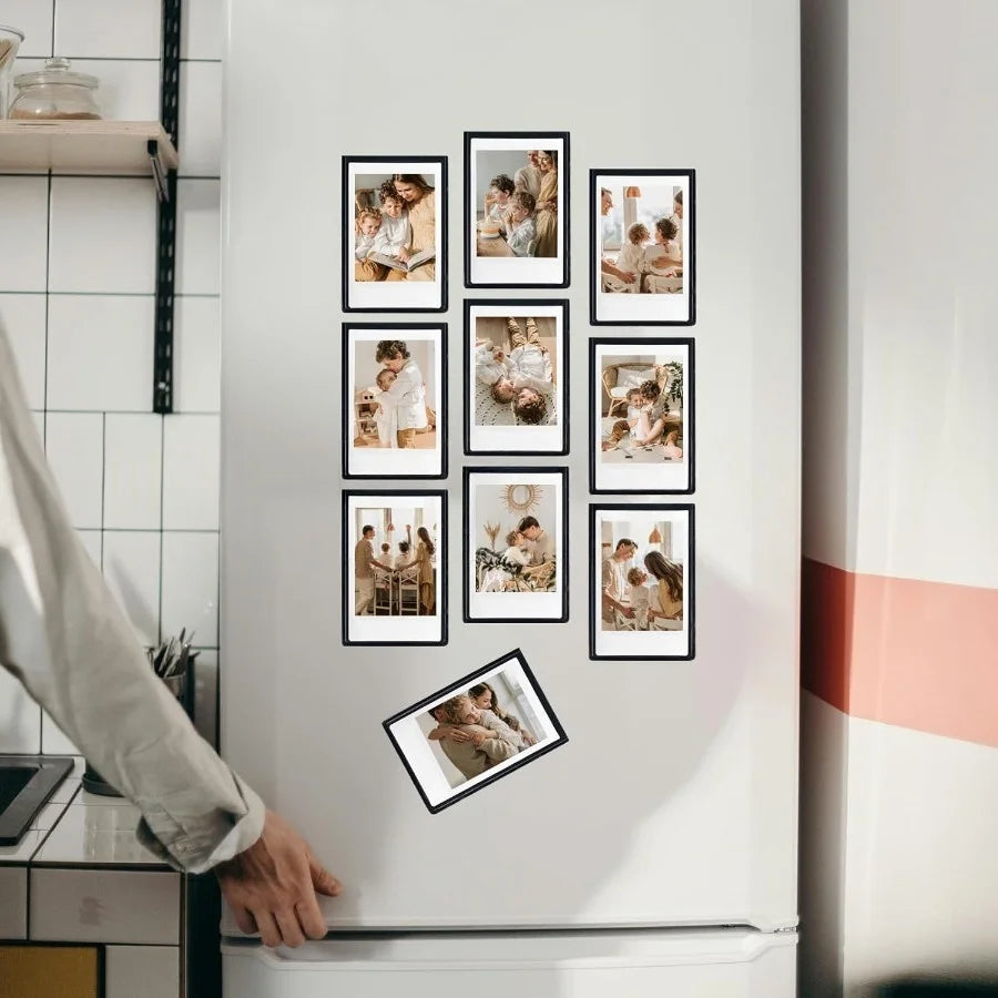 A white refrigerator door displays a grid of small black photo frames featuring family and candid moments.