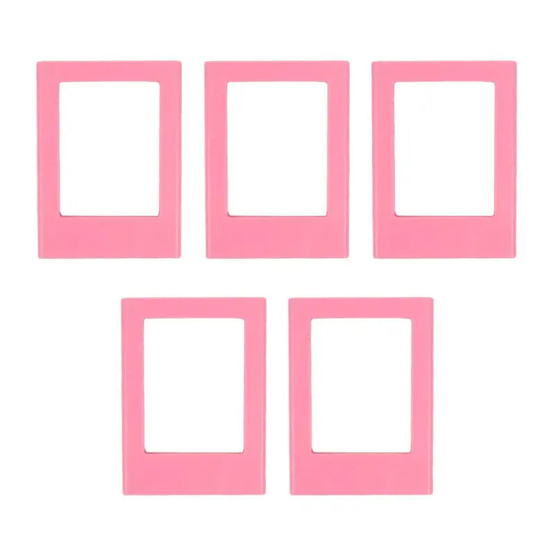 A set of five pink rectangular photo frame magnets.
