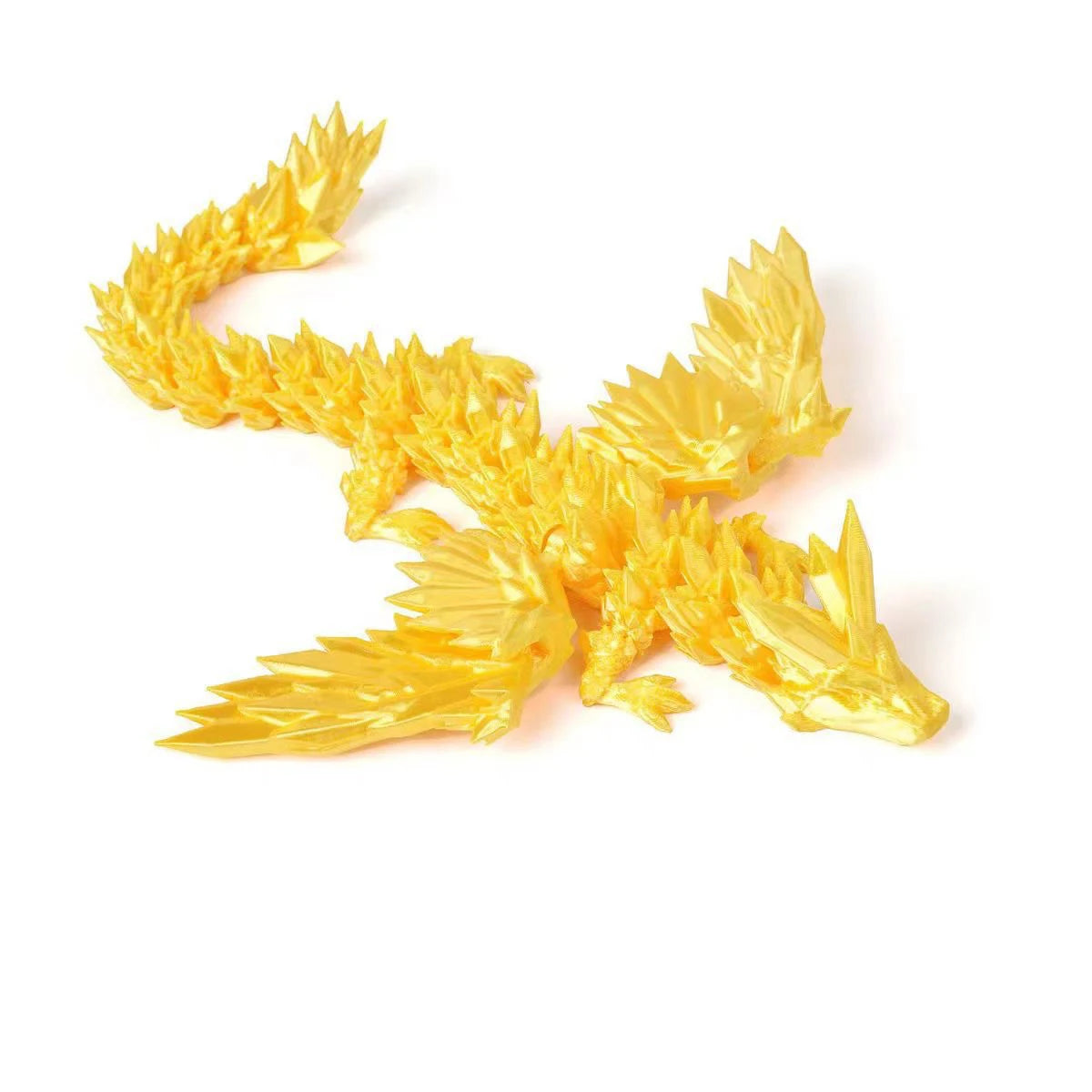 A golden, three-dimensional printed magic dragon ornament with detailed scales and fins.