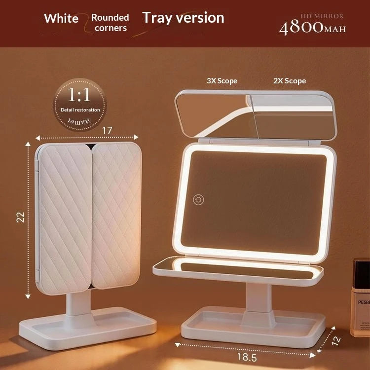 White tray version of a tri-fold LED makeup mirror with dimmable lighting shown in a studio setting.
