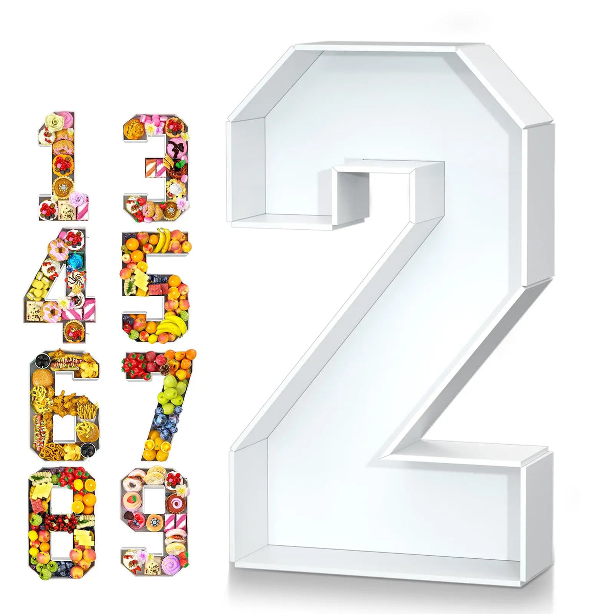 A white cardboard number 2 with various colorful edible decorations on the face