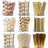 A collection of colorful striped and polka dot paper drinking straws in various patterns and colors.