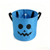 A light blue Halloween trick-or-treat bag with a black carved pumpkin face design.