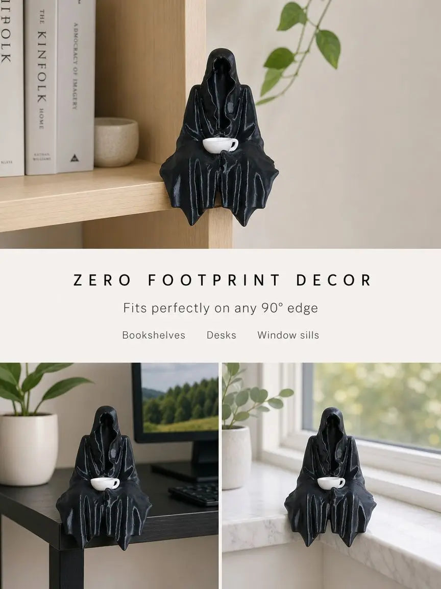 Black resin ghost statue with a tea cup sits on a wooden shelf.