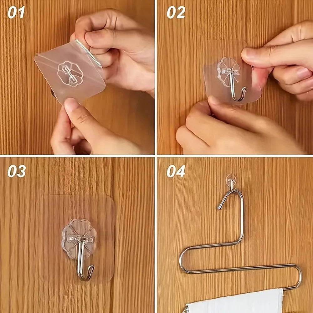 Step-by-step demonstration of applying heavy duty self-adhesive wall hooks onto a wooden surface.