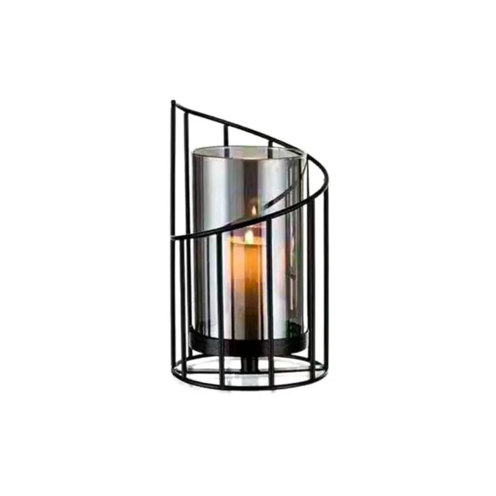 Elegant metal and glass candle holder with a cylindrical glass candle inside.