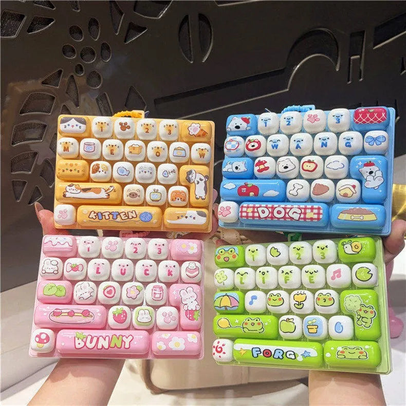 A collection of colorful cartoon animal keycap fidget toys arranged in various layouts and colors.