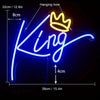 Neon sign shaped like a horse with a crown, glowing bright blue against a dark background.