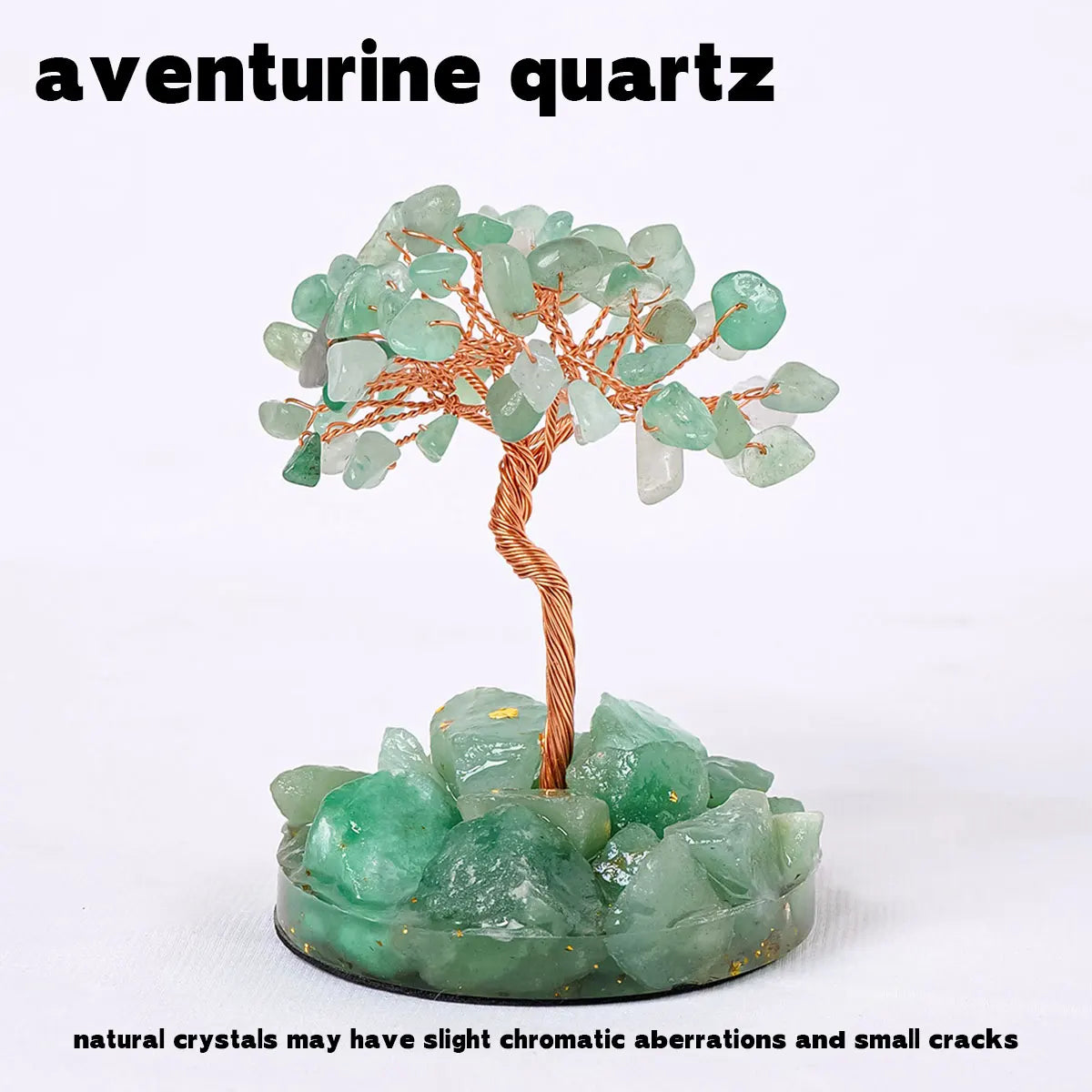 A natural aventurine quartz crystal tree featuring green and clear crystals on a base.