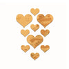 A set of ten heart-shaped acrylic mirror wall stickers in a gold or amber tone.
