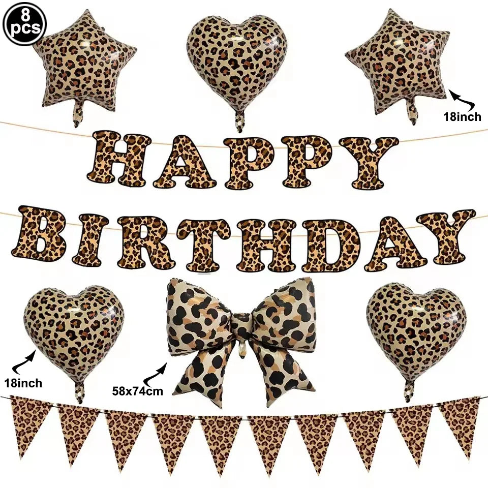 A set of leopard print foil balloons and decorative bunting for a birthday party