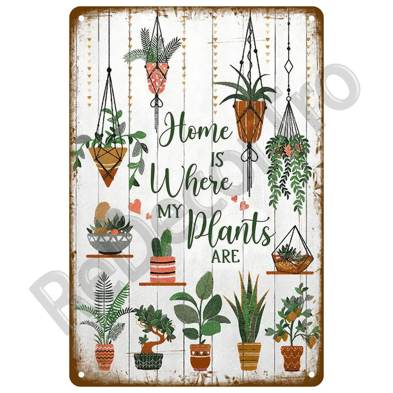 Vintage metal tin sign featuring illustrations of various houseplants and the text Home is Where My Plants Are