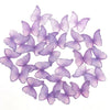 A collection of 48 pink butterfly cupcake toppers in various shades of lavender and purple.