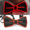 A black bow tie with orange trim and an EL wire light feature.