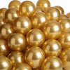 A close-up view of a set of shiny gold chrome metallic balloons.