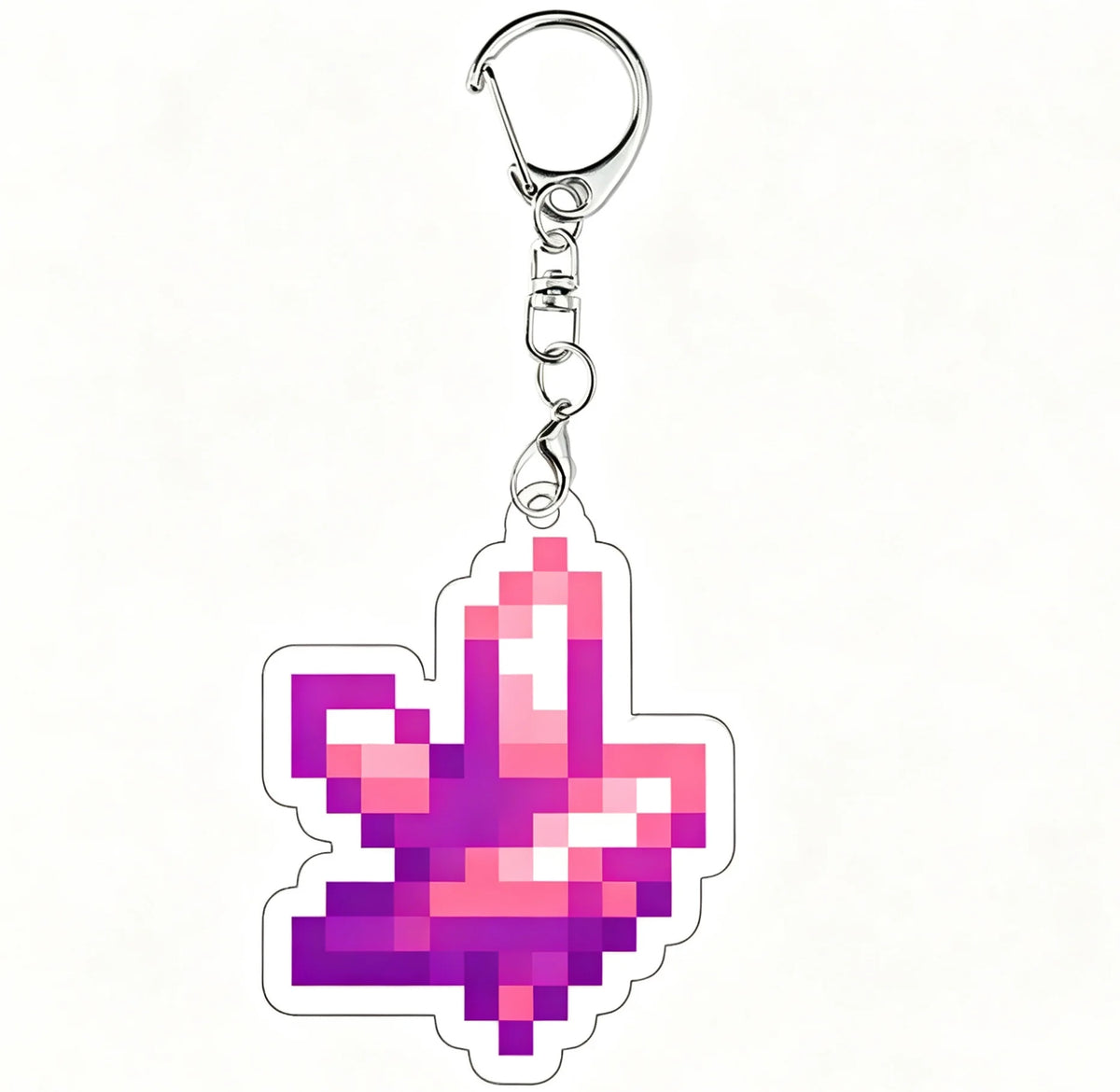A pink and purple pixel art charm shaped like a maple leaf attached to a silver keychain ring.