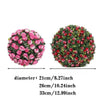A sphere of artificial pink and red roses used as decorative floral ball