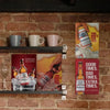 A set of vintage beer metal signs featuring Budweiser branding displayed on a rustic brick wall.