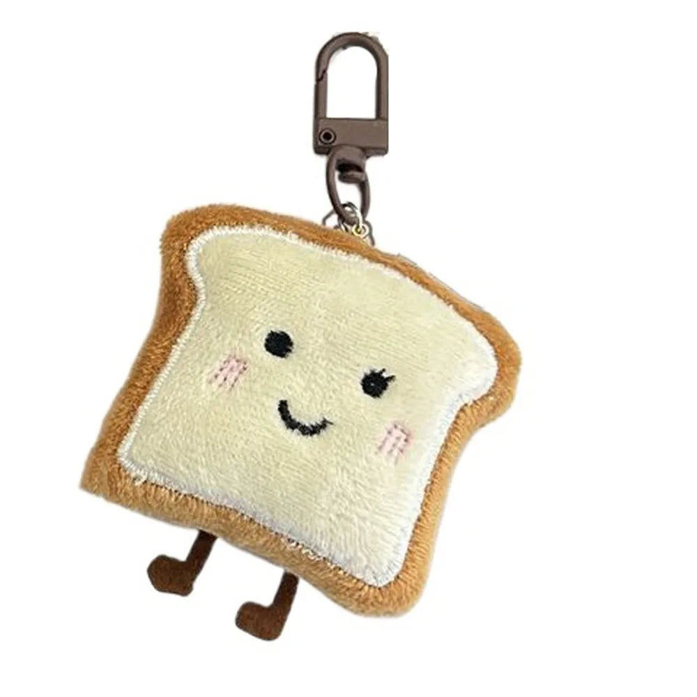 A cute plush keychain charm shaped like a slice of toast bread with a keyring attached.