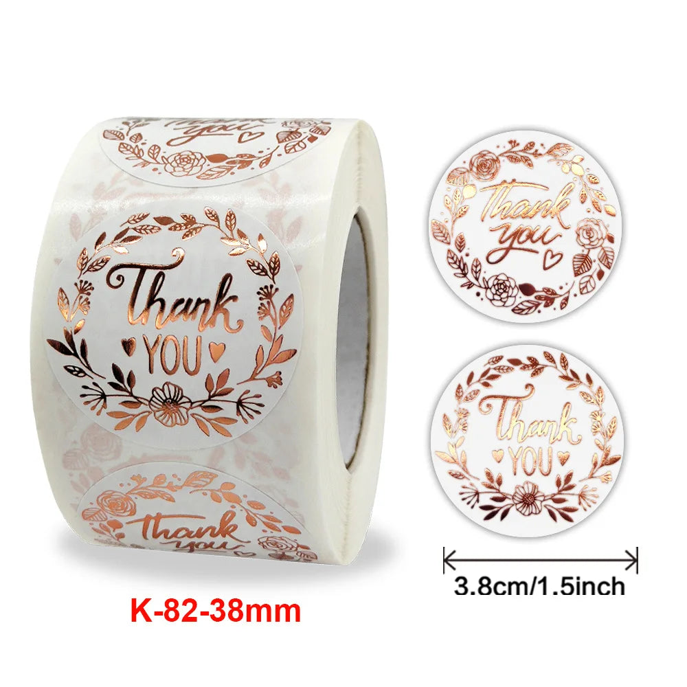 Roll of gold foil thank you sealing stickers with floral designs for envelopes and gifts