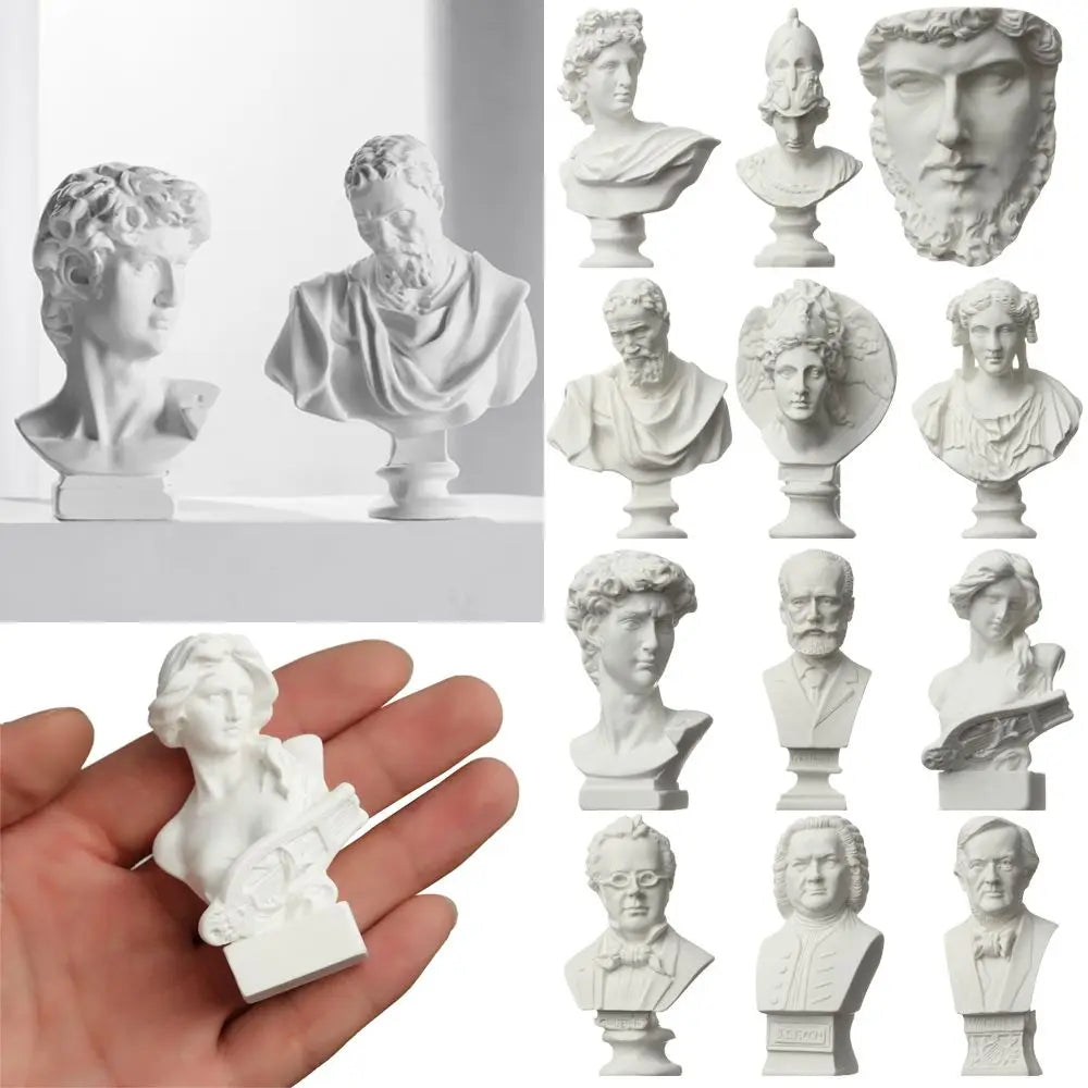 A collection of plaster bust miniatures depicting classical Greek mythology figures.