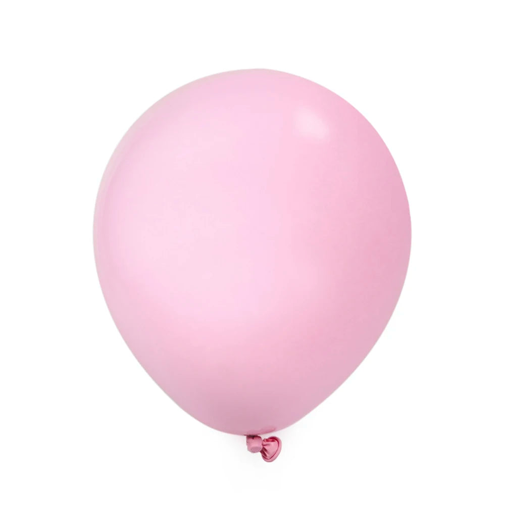 A single, smooth pink latex balloon against a white background.