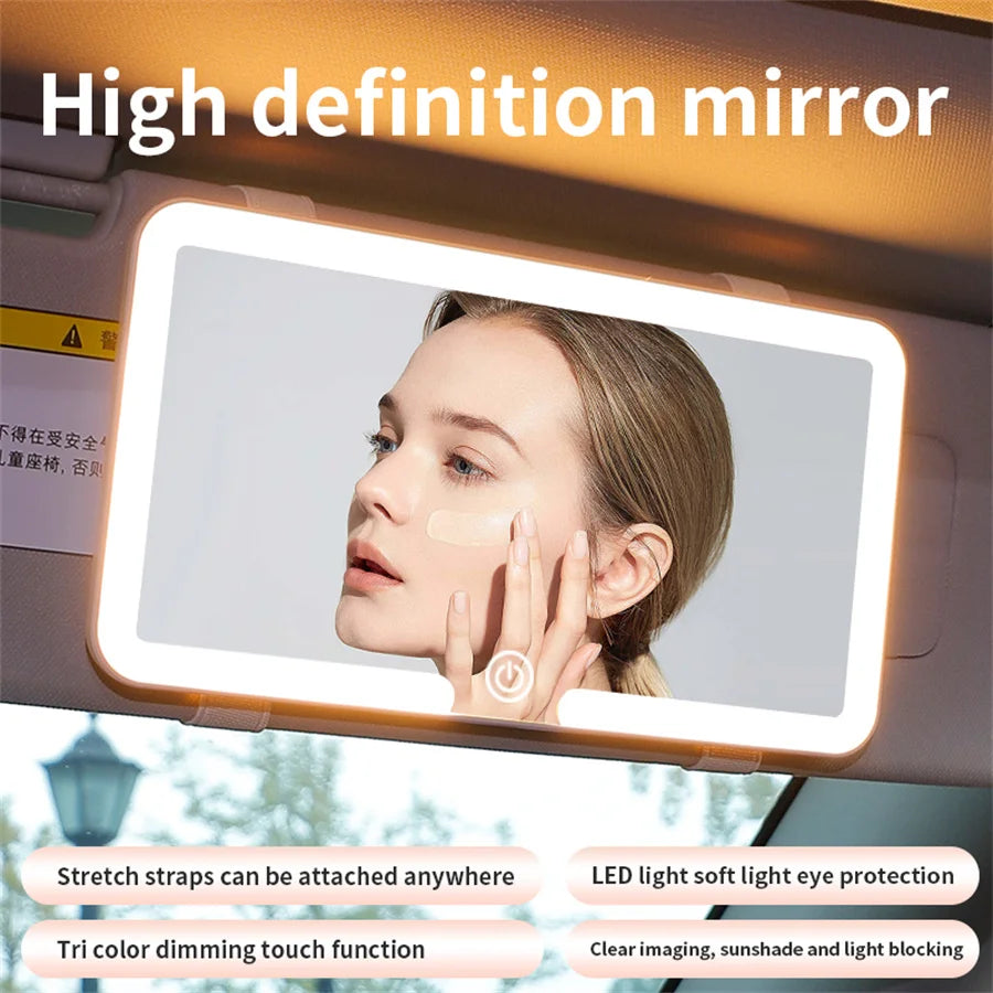 High definition vanity mirror mounted in a car window with an LED light and various features