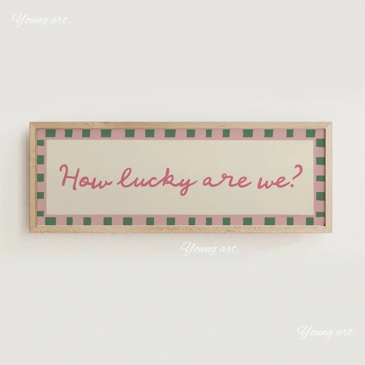 A framed canvas print with a light background and pink and green borders featuring the text How lucky are we?