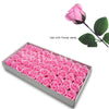 A box filled with pink artificial rose heads for wedding and party decor, shown next to a single rose stem.