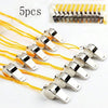 A collection of 5 plastic whistles with yellow lanyards is displayed, including a pack of 24.