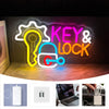 Neon wall sign displaying the text KEY & LOCK with a glowing yellow key and padlock icon.