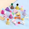 A colorful set of mini birthday cake toppers featuring various shapes and textures for parties