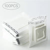 A stack of 100 disposable hanging ear coffee filter bags for pour-over brewing