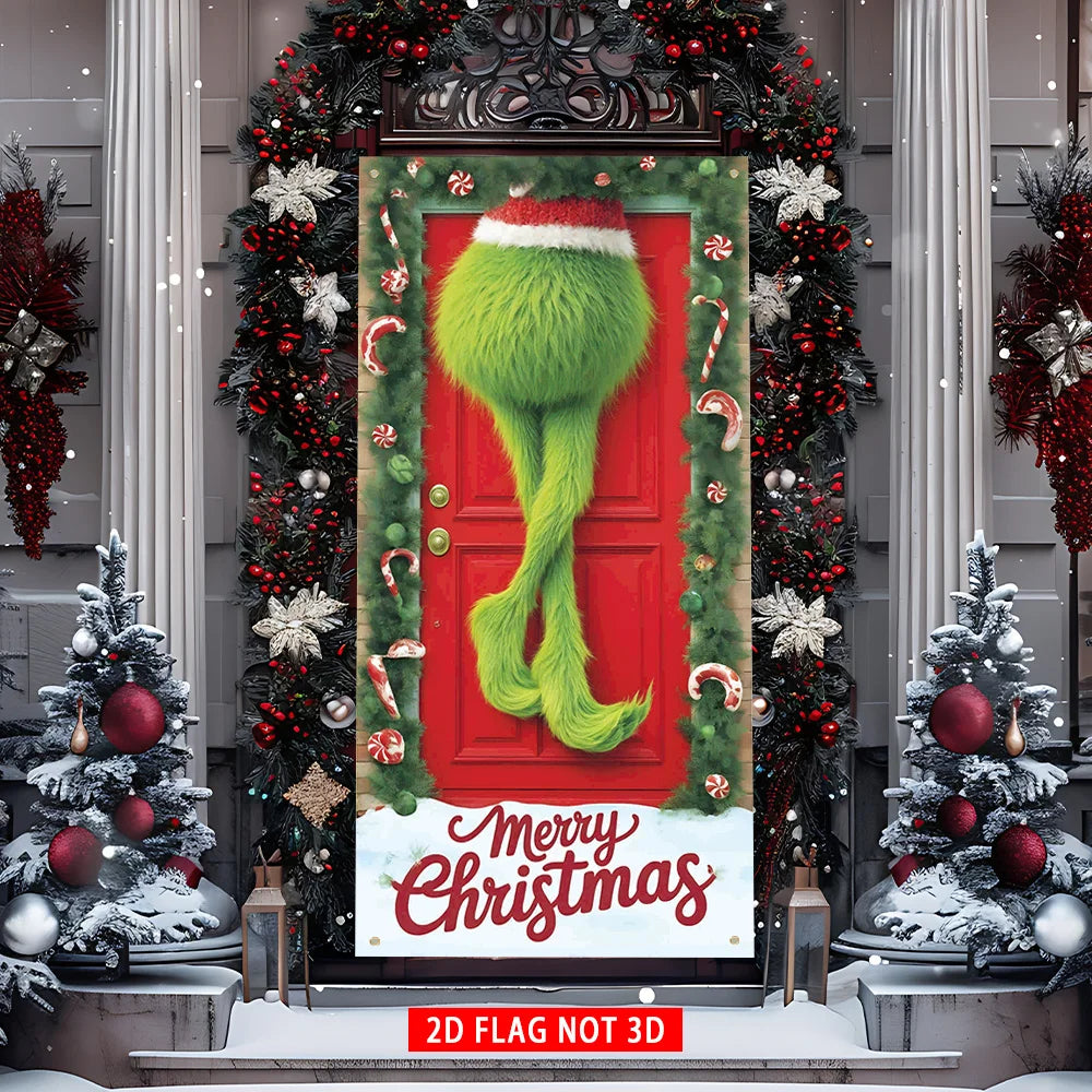 A festive red door cover flag decorated with green foliage and Christmas greenery, featuring a 'Merry Christmas' message.