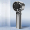 A silver portable rechargeable handheld fan with a circular grille and a digital display showing 100.