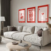 A modern living room featuring a light sofa, wooden coffee table, and framed retro letter art canvases on the wall.