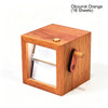 A wooden hand-crank flip photo frame with an LED light, made of orange wood.