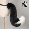 A black faux fur fox tail and ear costume set displayed on a mannequin.