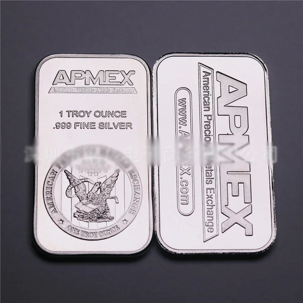 Two silver bullion bar replicas labeled APMEX featuring a Troy ounce of fine silver.