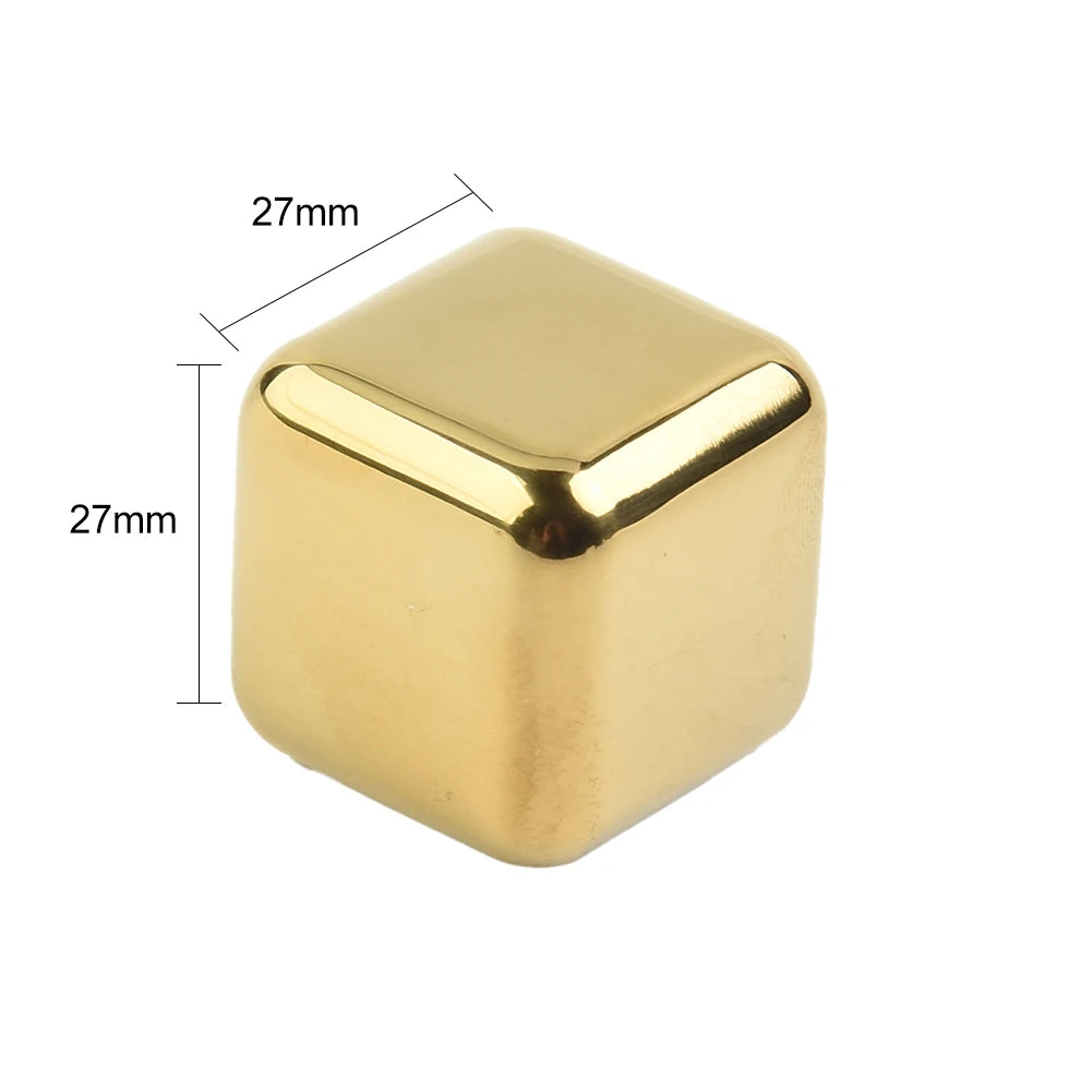 A square, gold-colored stainless steel ice cube with dimensions of 27mm on each side.