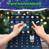A hand is placing a crystal gemstone into a Christmas advent calendar box filled with various natural crystals.