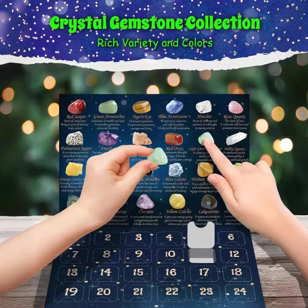 A hand is placing a crystal gemstone into a Christmas advent calendar box filled with various natural crystals.