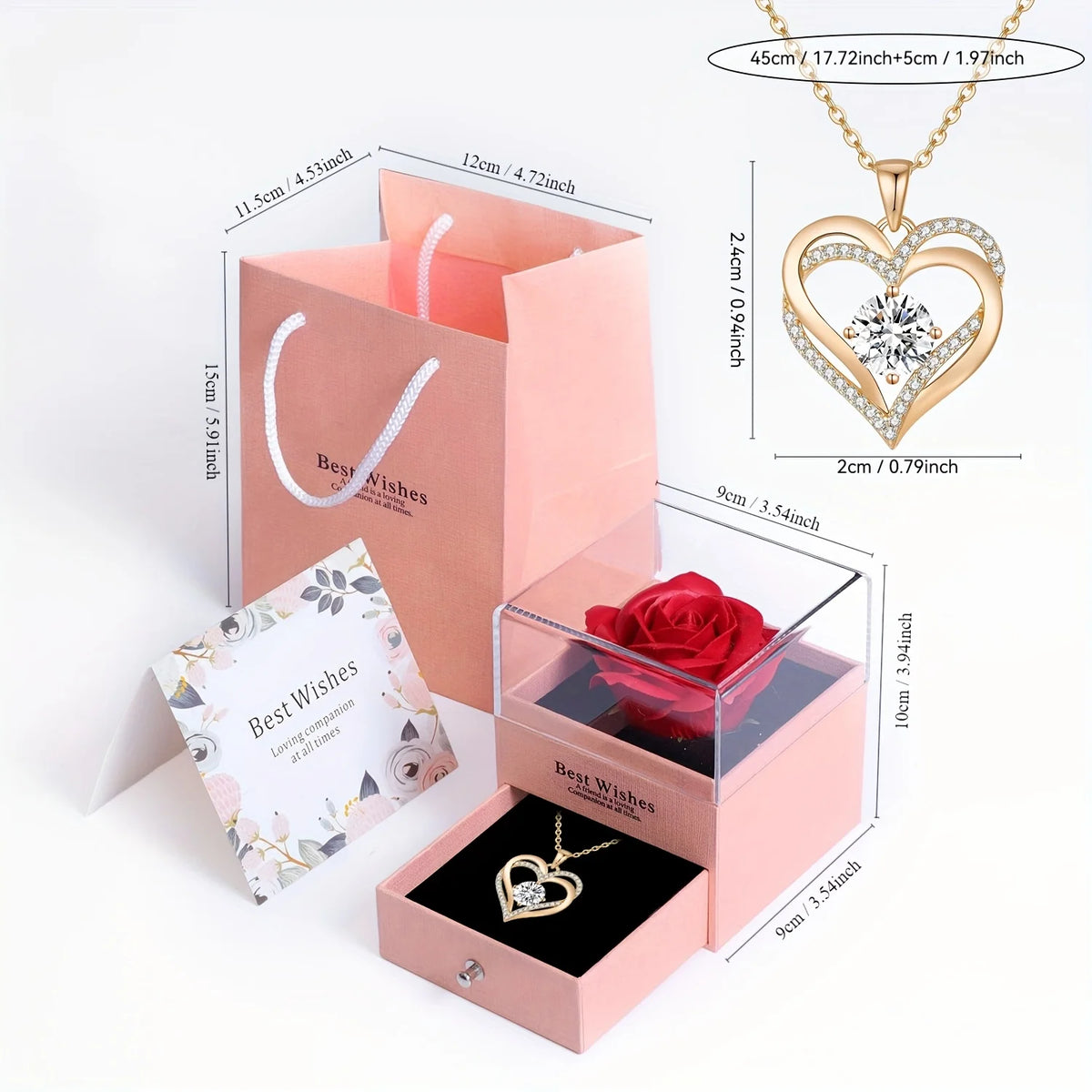 A pink gift box set containing an artificial rose and a gold heart pendant necklace.