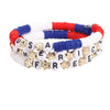 Beaded stretch bracelets featuring the American flag design in red, white, and blue colors.