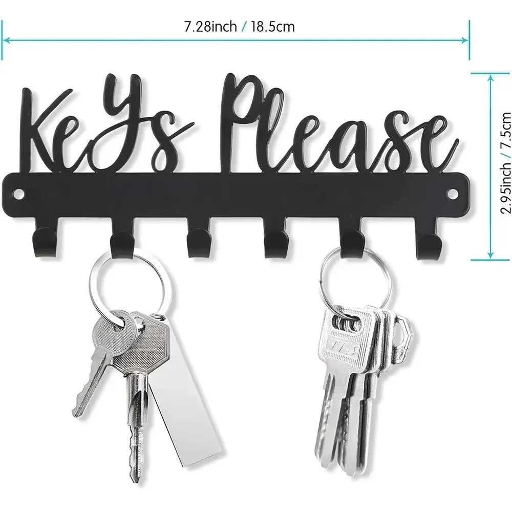 Black wall-mounted metal key holder with hooks for keys and small items