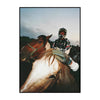 A close-up photo of a horse's head and neck with a rider wearing a helmet and protective gear.