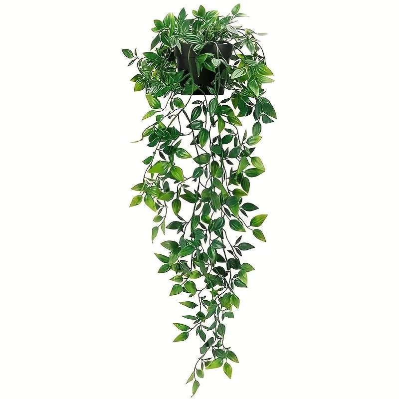 A long, cascading green artificial plant hanging from a pot for home decor