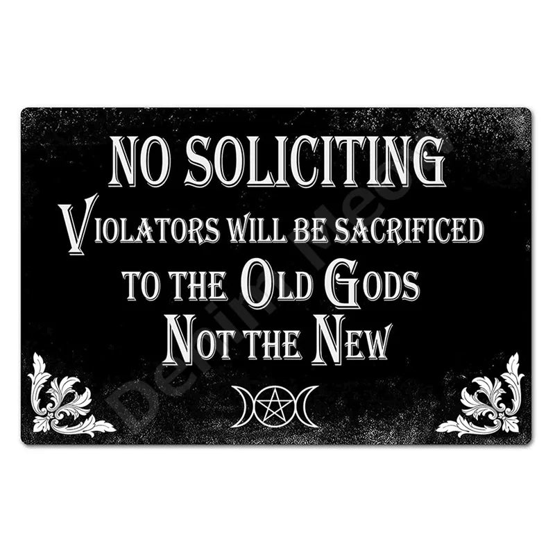A black metal wall sign with white text that reads No Soliciting Violators Will Be Sacrificed to the Old Gods Not the New
